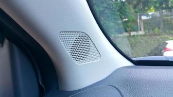 Close-up of a tweeter speaker in a car photo