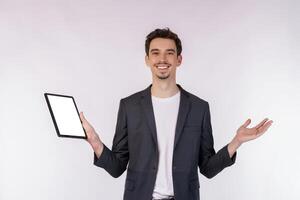 Portrait of attractive cheerful businessman using device app searching web isolated over white color background photo