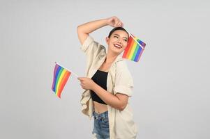 Pretty woman LGBQ pose with muli-color flag photo