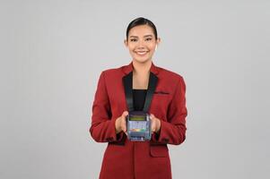 Young beautiful woman in formal clothing for officer on white background photo