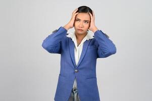 Young beautiful woman in formal clothing for officer headache posture photo