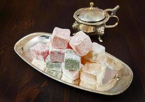 Rose flavoured Turkish delight in traditional silver bowl photo