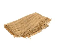 folded brown burlap fabric and isoleted on white background photo