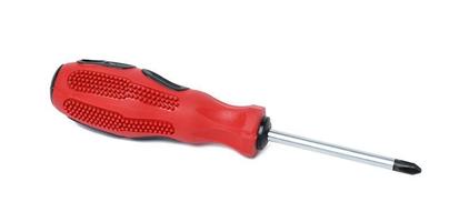 Screwdriver with a rubber handle on a white isolated background photo