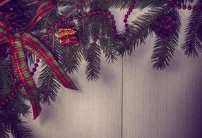 Vintage Christmas background with decorated branches of spruce photo