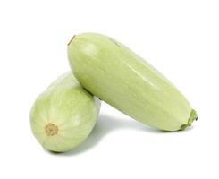 Green zucchini isolated on white background, fresh vegetables photo