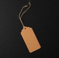 empty paper rectangular brown tag on a rope photo