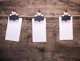 paper tags hanging on a rope photo