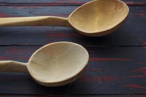Two empty wooden spoon photo