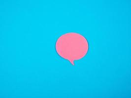 pink sticker in the shape of a cloud on a blue background photo