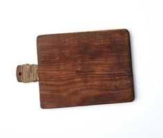 very old empty wooden rectangular cutting board, top view photo