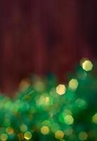 Christmas brown background with green bokeh photo