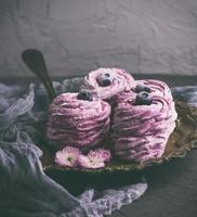 pink round airy marshmallow with berries photo