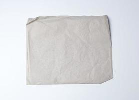 empty gray crumpled sheet of paper, full frame photo