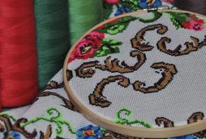 Detail of the embroidery hoop in a cross photo