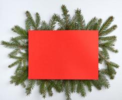 congratulatory Christmas background with an empty red sheet photo