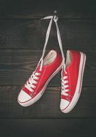 a pair of old red sneakers photo