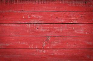 Red wooden background of boards photo