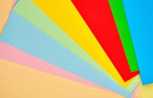 laid out bright multicolored paper, abstract background photo