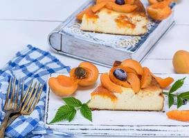 piece of cheesecake with apricots photo