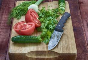 vegetables from the garden on the kitchen blackboard photo