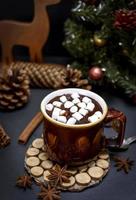 mug with hot chocolate and small white marshmallow slices photo