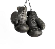 pair of very old vintage black leather boxing gloves photo