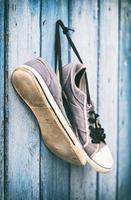 pair of old cloth-worn mans shoes photo