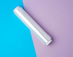 roll with transparent white polyethylene for wrapping products and packaging goods photo