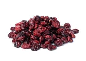 a bunch of dried cranberries on a white background. Delicious berry photo