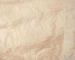 crumpled brown baking parchment paper, full frame photo