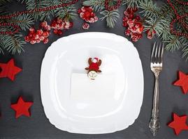 empty white square plate and fork photo