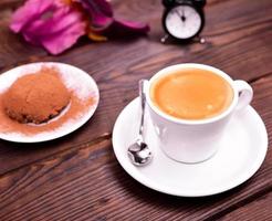 espresso in a white cup with saucer photo