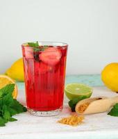 red strawberry lemonade in a glass photo