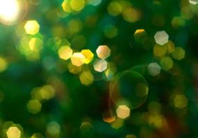 Green background with yellow bokeh, blurred background photo