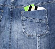 plastic credit card in the back pocket of the jeans photo