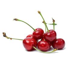 Ripe red cherry on a white isolated background. photo