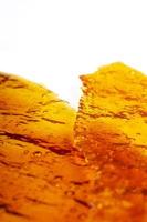 golden extract crystalline cannabis wax. concentrate high thc photo
