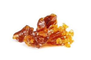 amber pieces of cannabis wax clsoeup. concentrate dab with high thc photo