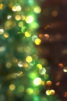 Christmas background with green and yellow bokeh photo