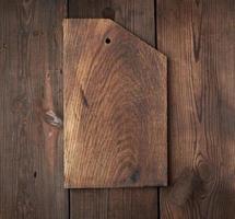 very old empty wooden rectangular cutting board, top view photo