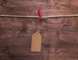 brown paper tag hanging on a rope photo