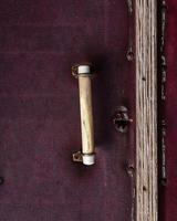 old entrance door to the room with a handle photo