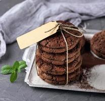 stack of round chocolate chip cookies tied with a rope photo