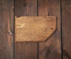 very old empty wooden rectangular cutting board, top view photo