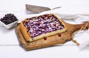 piece of pie from cottage cheese and blueberries photo