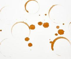 lot of round imprint from a coffee cup on a white paper background photo