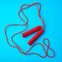 red rope for sports on a blue background photo