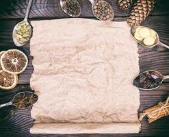 empty brown kraft paper sheet and spices photo