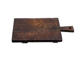 very old brown kitchen cutting board with holder photo